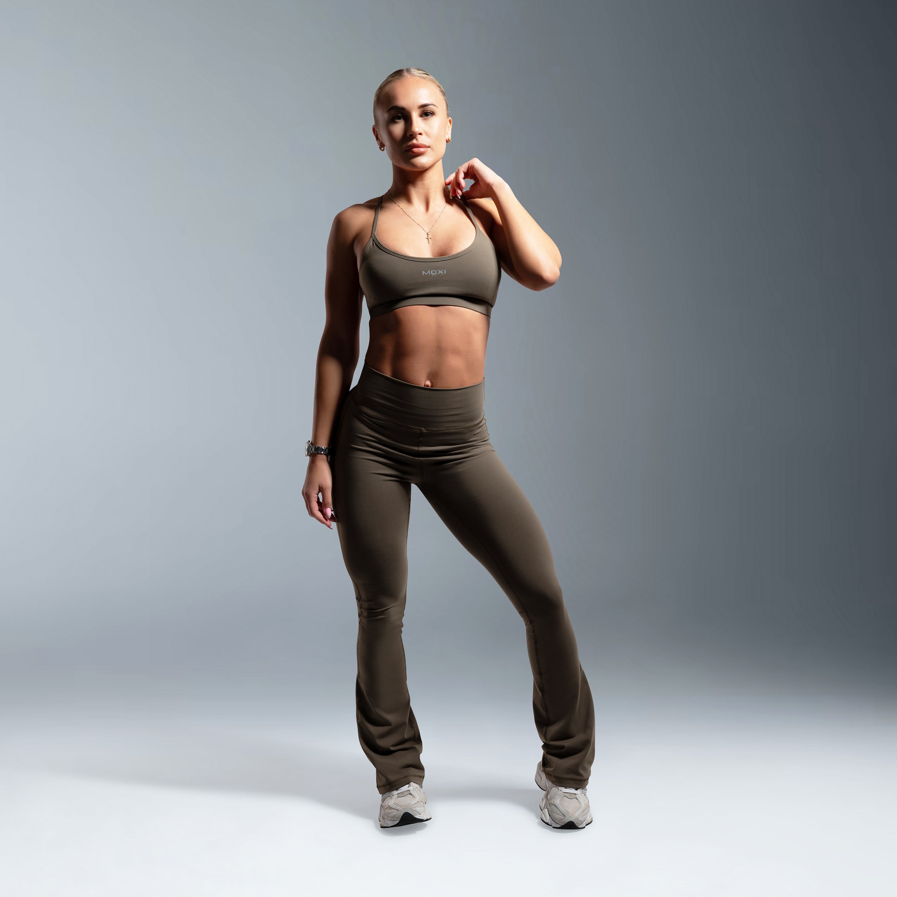 COURAGEOUS_KHAKI-_SPORTBRA_FLARE_LEGINS_-2_ba03a438-2642-49ba-8f47-0bf7d07ca6ba.jpg